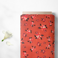 Тканина плательна штапель з малюнком лілейник теракот