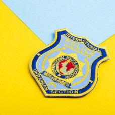 Шеврон на липучці International Police Association 8х9 см вишитий патч нашивка